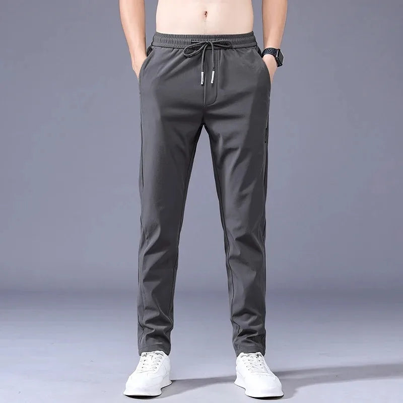 Men's New Casual Pants Fashion Stretch Straight Slim Pants Hong Kong Wind Ice Silk Loose Everything Trend Foreign Jogging Pants