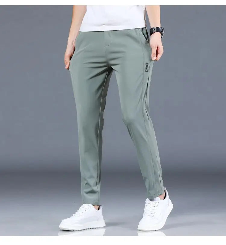 Ice silk men's pants 2025 summer new black gray thin business casual pants outdoor elastic breathable straight leg sports pants