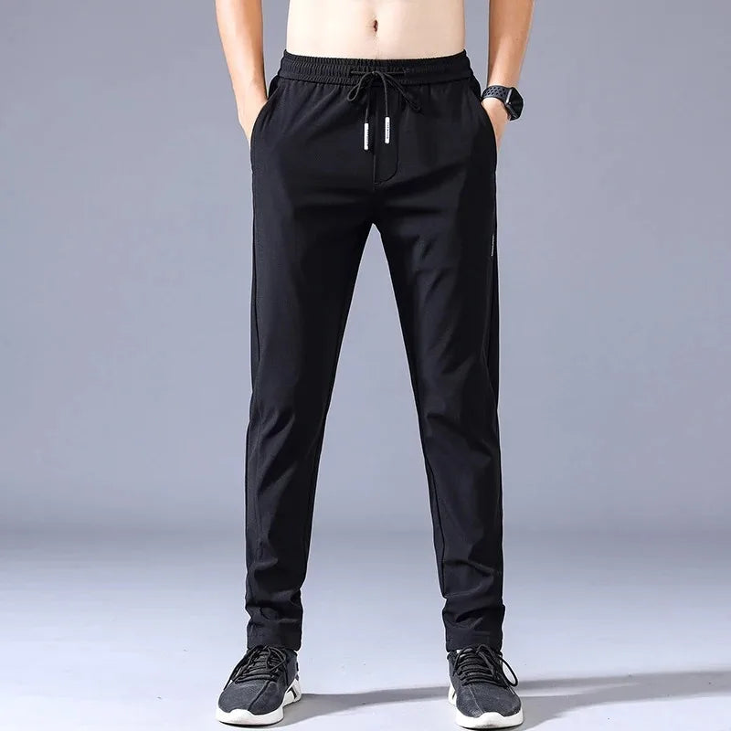Men's New Casual Pants Fashion Stretch Straight Slim Pants Hong Kong Wind Ice Silk Loose Everything Trend Foreign Jogging Pants