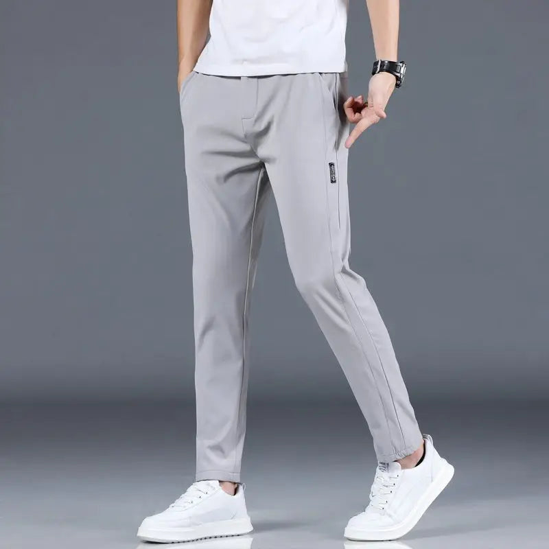 Ice silk men's pants 2025 summer new black gray thin business casual pants outdoor elastic breathable straight leg sports pants