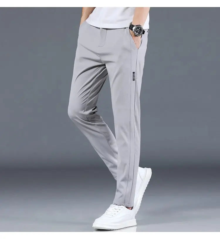 Ice silk men's pants 2025 summer new black gray thin business casual pants outdoor elastic breathable straight leg sports pants
