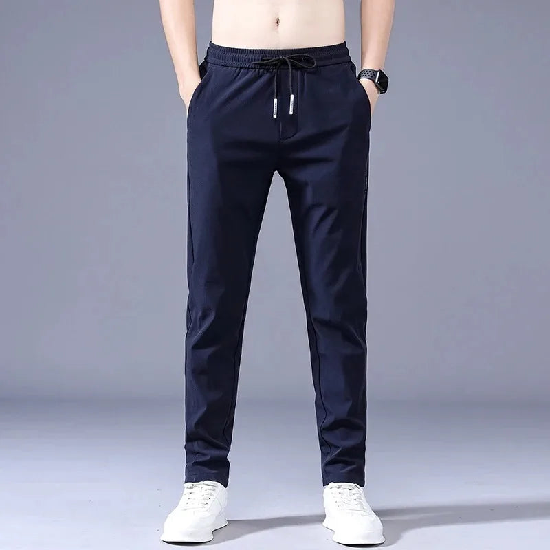 Men's New Casual Pants Fashion Stretch Straight Slim Pants Hong Kong Wind Ice Silk Loose Everything Trend Foreign Jogging Pants