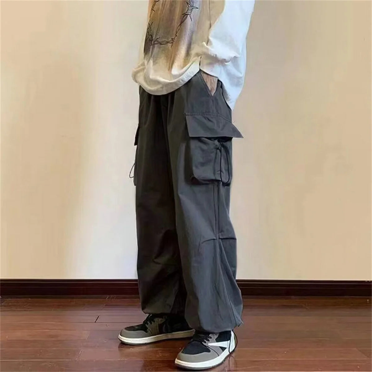 Streetwear 2024 Spring Harem Casual Pants Men Elastic Waist Solid Color Cargo Pants Multi Pocket Loose Baggy Pants For Women