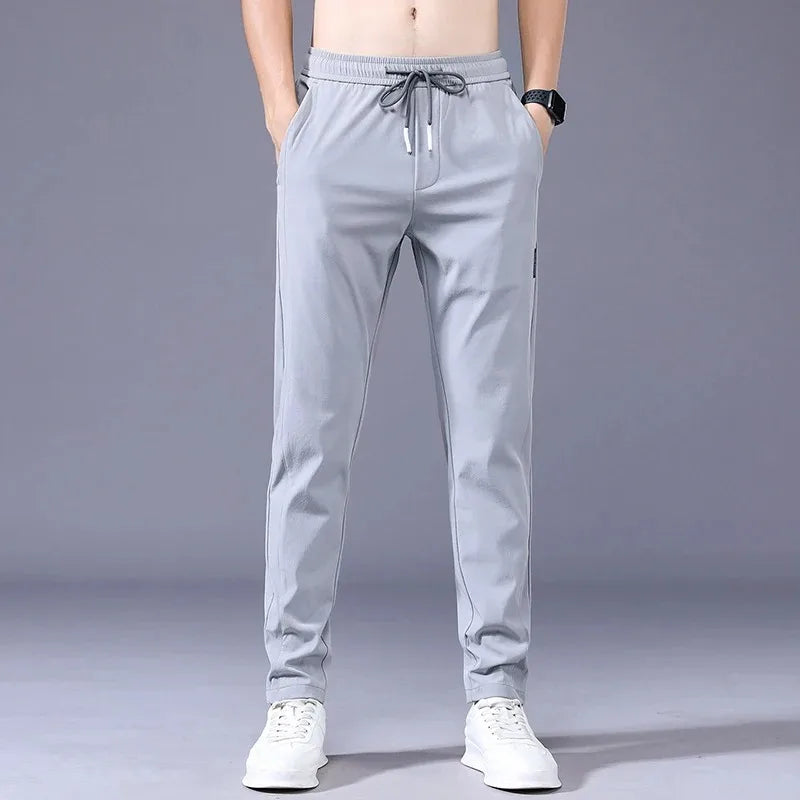 Men's New Casual Pants Fashion Stretch Straight Slim Pants Hong Kong Wind Ice Silk Loose Everything Trend Foreign Jogging Pants